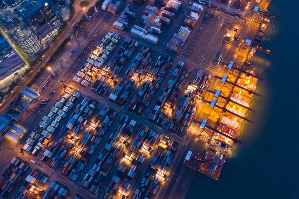container cargo ship in the export and import business and logistics. Shipping to the harbor